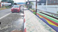 Desa Buku Tenggara Bangun Trotoar, Taman dan Penutup Saluran Air
